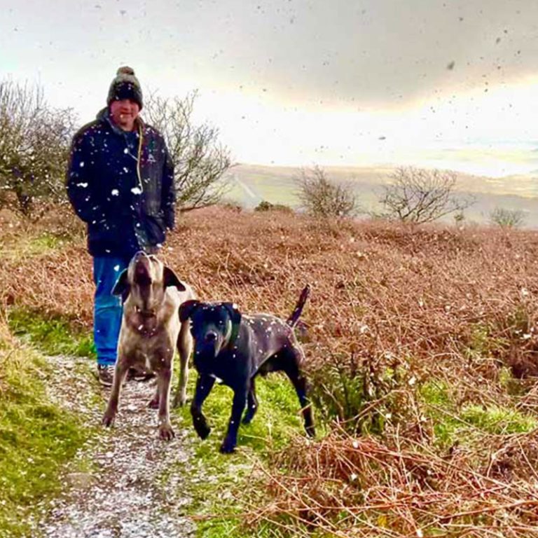 Tim walking our dogs Rico and Nero at Kit Hill